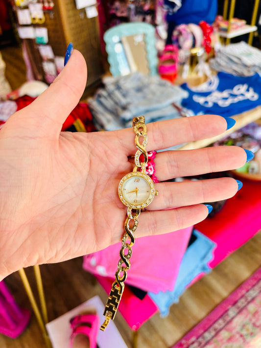 GOLD AND PEARL WATCH